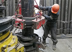 Oil Rig Worker Operating Pipe Handling Equipment