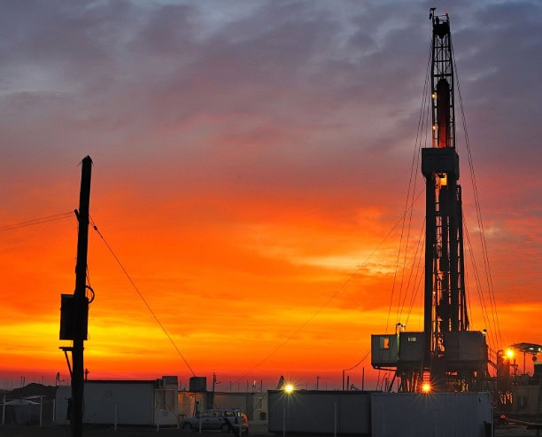 Oil Well At Sunset