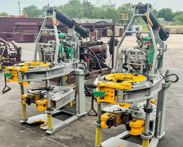 Twin Iron Roughneck Machines On Oilfield Yard